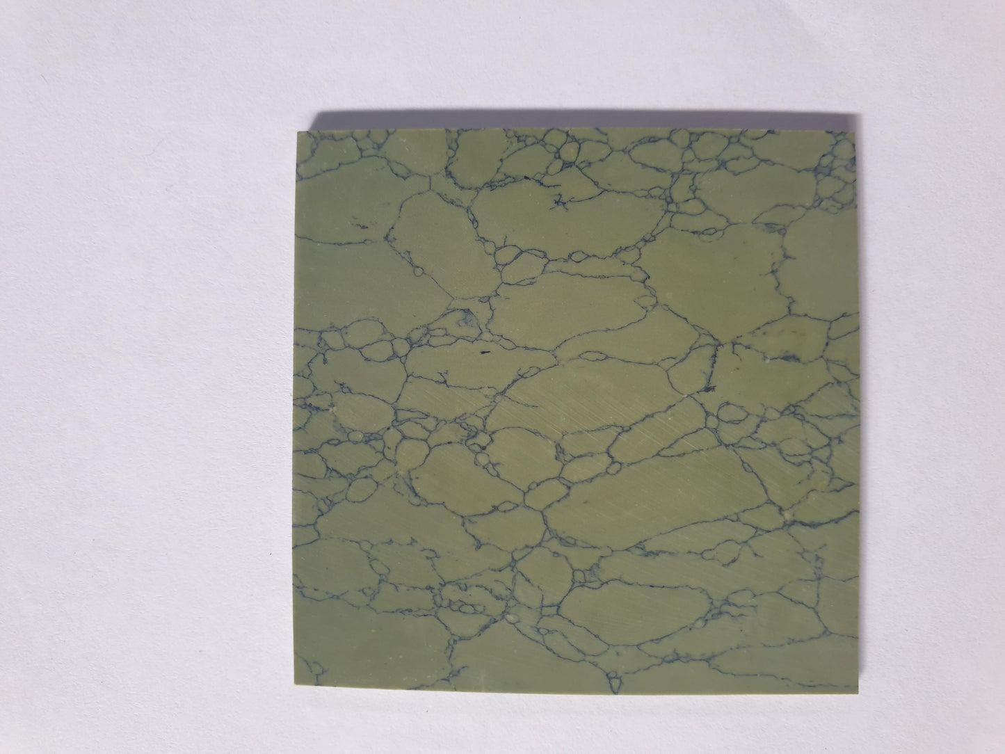 <p>Olive stone artificial stone blanks 50 x 50 x 1.5mm suitable for inlay. Can be cut with standard cutting tools - jewellery saw similar in characteristics to mother of pearl (hardness approx. 3. Can be sanded and polished same way as shell material. All pcs are A grade good on both sides.</p>