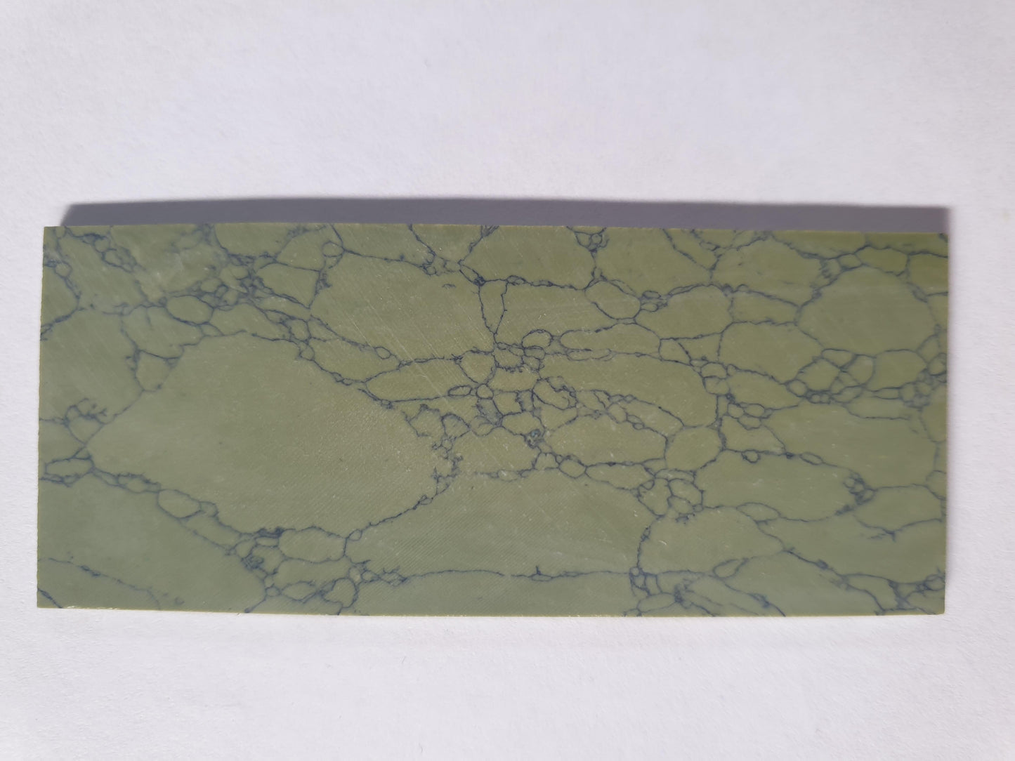 <p>Olive stone artificial stone blanks 30 x 70 x 1.5mm suitable for inlay. Can be cut with standard cutting tools - jewellery saw similar in characteristics to mother of pearl (hardness approx. 3. Can be sanded and polished same way as shell material. All piecs are A grade good on both sides.</p>