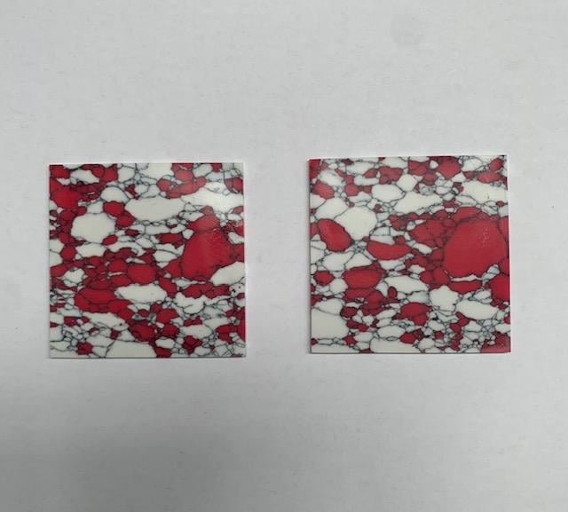 <p>Kakortokite E38 reconstituted stone blanks 50x50x1.5mm thickness - flat pcs cut to precise diameter and thickness. Ideal for use in inlay applications - for fretboard markers, and general inlay or jewellery decorations.</p>