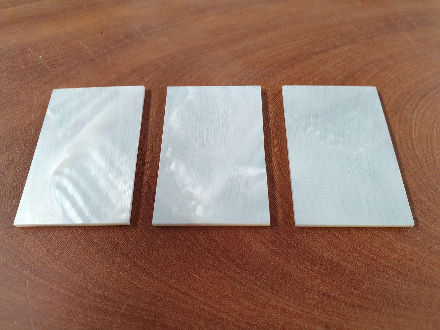 <p>White Mother of Pearl flat inlay blanks size 35mm (1.38") width x 55mm (2.16") length x 2mm (0.78") thickness A grade good on both sides.</p>