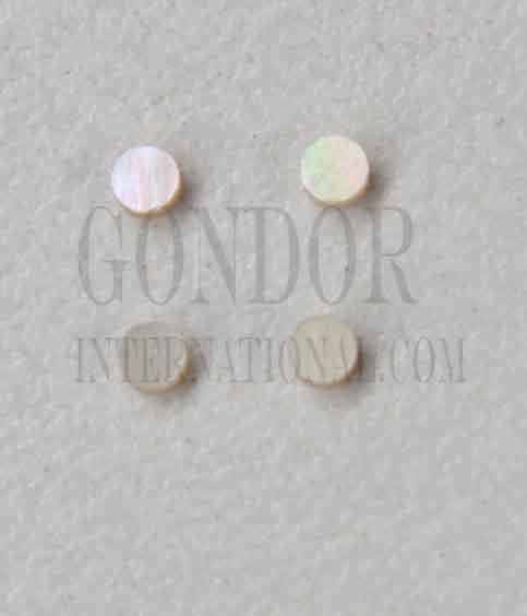 Green Turban (Green snail) shell dots 2mm diameter 1.5mm thickness are round flat shell pcs cut to precise diameter and thickness. Ideal for use in inlay applications - for fretboard markers and general inlay or jewellery decorations. All dots are A grade.