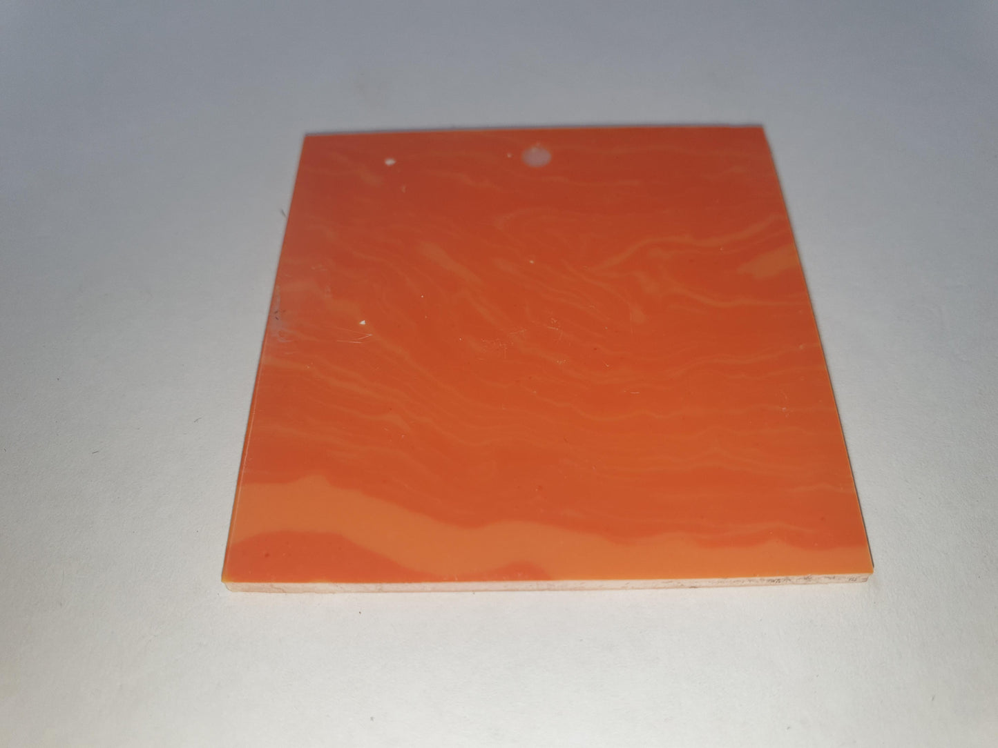 <p>Sun Stone K099 reconstituted stone blanks 50 x 50 x 2mm suitable for inlay. Can be cut with standard cutting tools - jewellery saw similar in characteristics to mother of pearl (hardness approx. 3. Can be sanded and polished same way as shell material. All pcs are A grade good on both sides.</p>