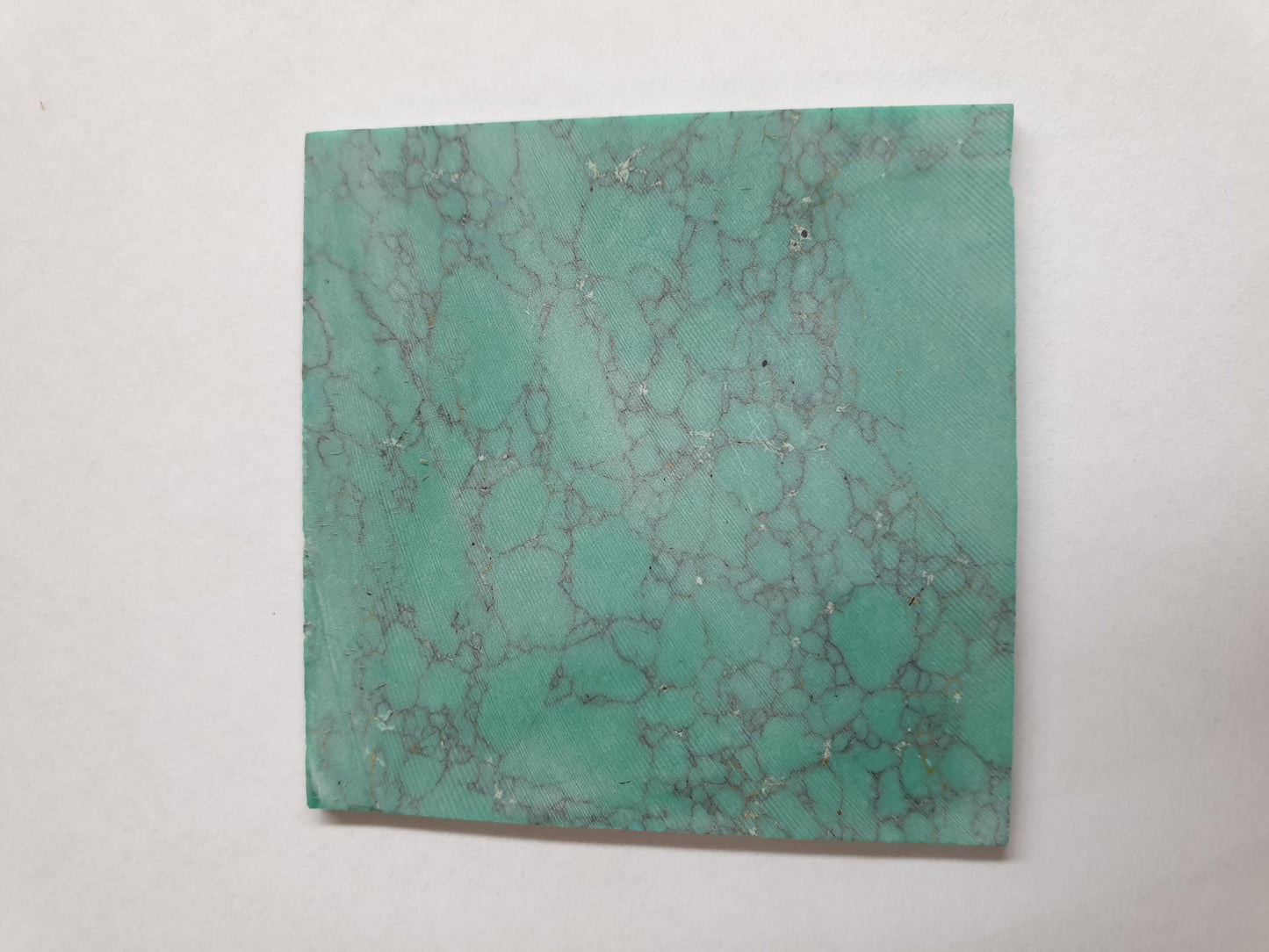 <p>Turquoise Green M114 artificial stone blanks 50 x 50 x 1.5mm. Suitable for inlay and other decorations. Can be cut with standard cutting tools - jewellery saw similar in characteristics to mother of pearl (hardness approx. 3. Can be sanded and polished same way as shell material. All pcs are A grade good on both sides.</p>