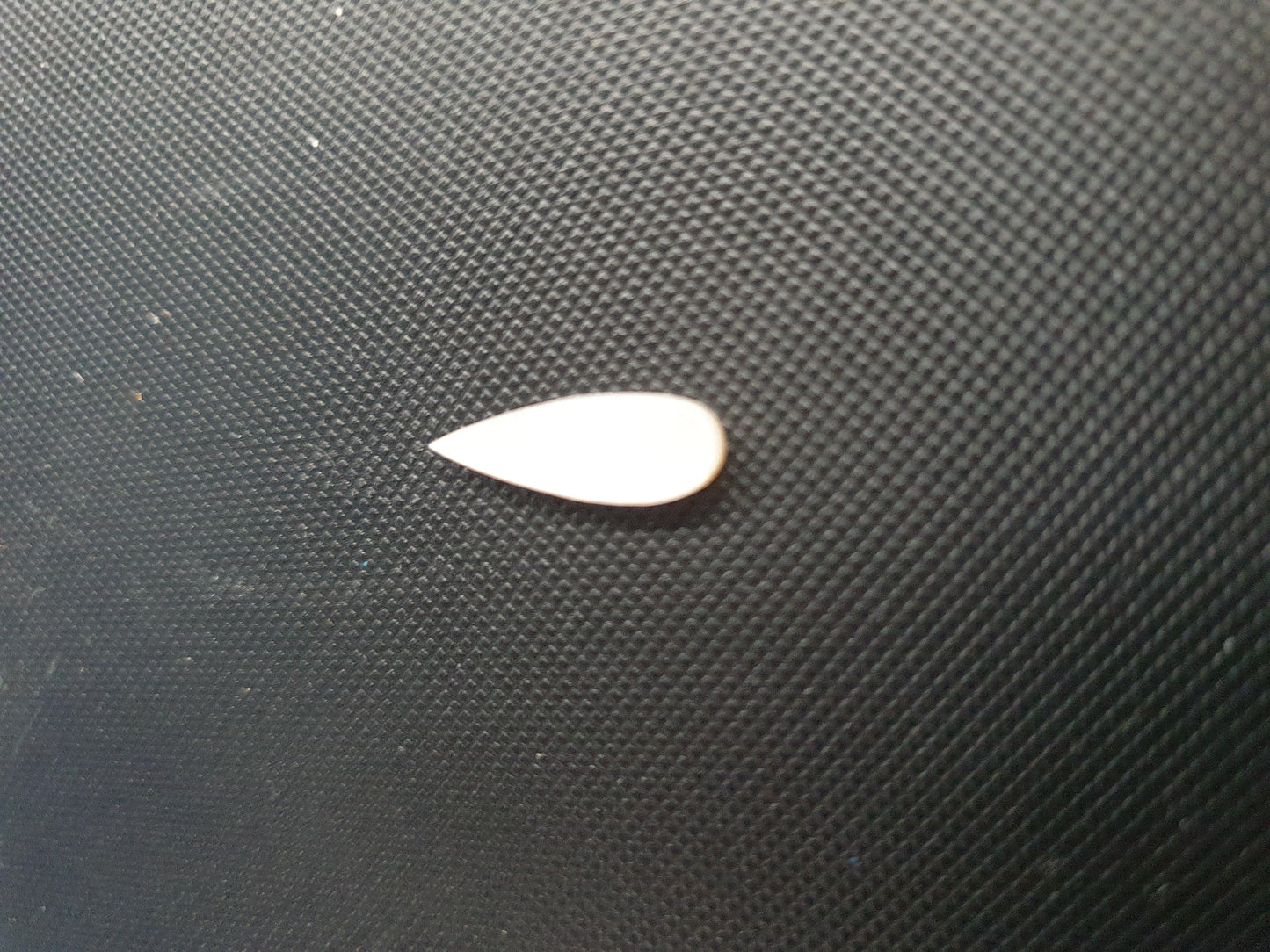 <p>White Mother of Pearl inlay tear drop 3.3 x 10.2 x 1.8mm thickness. Some uses include fretboard markers, musical instrument inlay, furniture inlay and other general decorative inlay and jewellery applications. All pcs are A grade.</p>