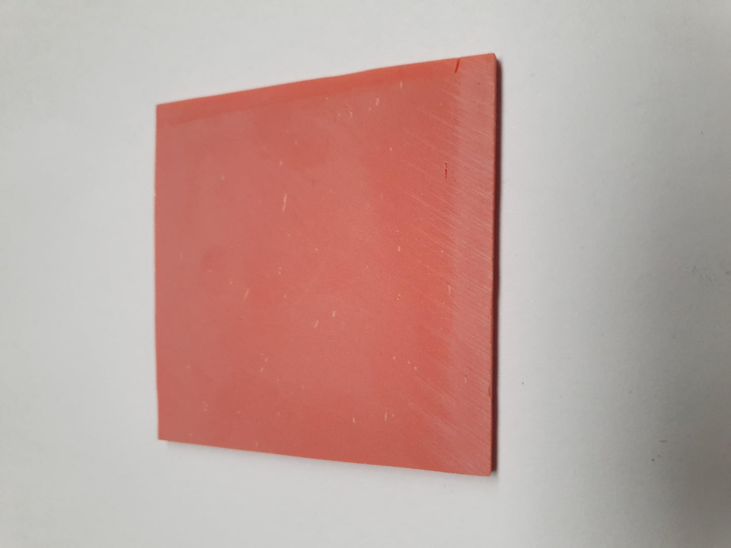 <p>Orange stone artificial stone blanks 50 x 50 x 2mm suitable for inlay. Can be cut with standard cutting tools - jewellery saw similar in characteristics to mother of pearl (hardness approx. 3. Can be sanded and polished same way as shell material. All pcs are A grade good on both sides.</p>