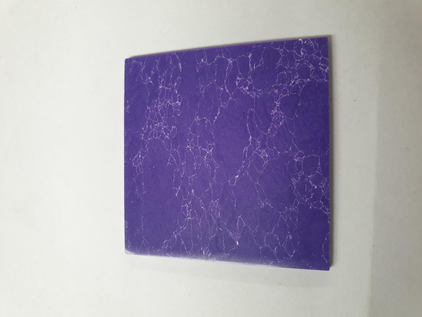 Amethyst N115 artificial stone blanks 50x50x1.5mm suitable for inlay. Can be cut with standard cutting tools - jewellery saw similar in characteristics to mother of pearl (hardness approx. 3. Can be sanded and polished same way as shell material. All pcs are A grade good on both sides.
