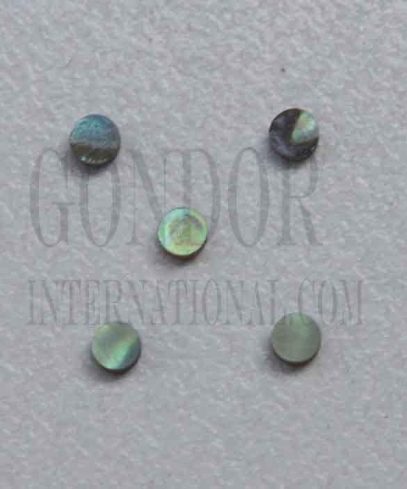 Paua shell dots 2mm diameter x 1.5mm thickness are round flat shell pcs cut to precise diameter and thickness. Ideal for use in inlay applications - for fretboard markers and general inlay or jewellery decorations. All dots are A grade.