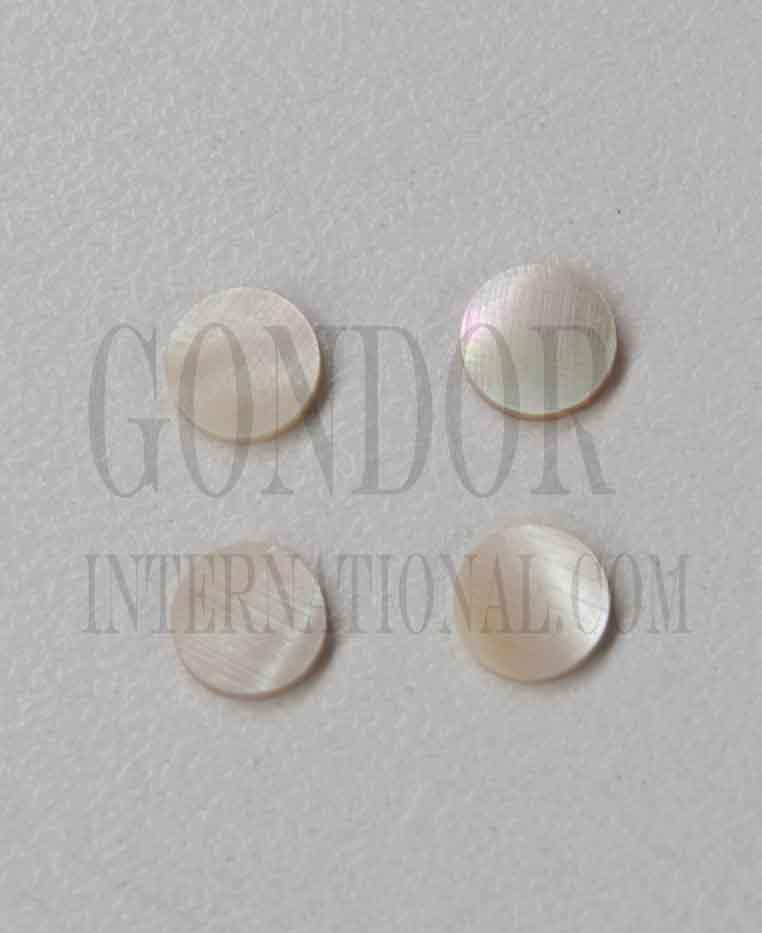 Green Turban (Green snail) shell dots 5mm diameter 1.5mm thickness are round flat shell pcs cut to precise diameter and thickness. Ideal for use in inlay applications - for fretboard markers and general inlay or jewellery decorations. All dots are A grade.