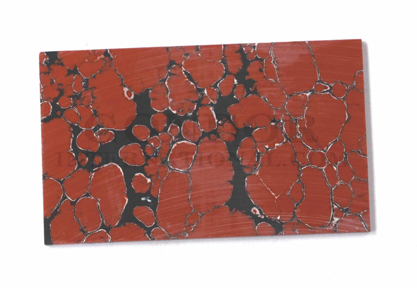 Leopard Jasper reconstituted stone blanks 30 x 50 x 2mm suitable for inlay. Can be cut with standard cutting tools - jewellery saw similar in characteristics to mother of pearl (hardness approx. 3. Can be sanded and polished same way as shell material. All pcs are A grade good on both sides.