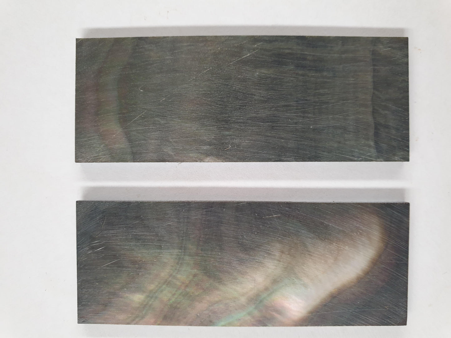 Black Mother of Pearl flat inlay blanks size 25.4mm (1") width x 76.2mm (3") length x 2.8mm thickness. Polished 1 side. These pcs B grade face side is 20 - 60% black rest is white Face side is flat.