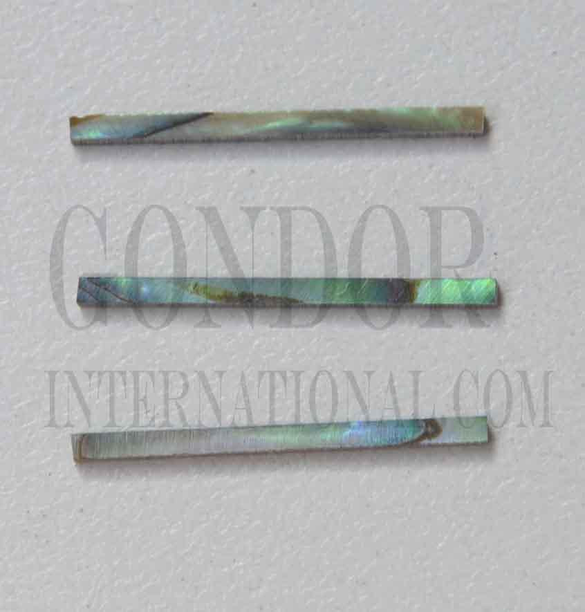 Paua solid shell straight strips 1.2mm (0.047") width x 25 (1") length x 1.5mm (0.06") thickness. A grade quality good on both sides, flat and uniform in thickness and width. Ideal for use in purfling on musical instruments - Ukuleles, guitars, mandolins etc. as well as in furniture, jewellery ans other decorative applications.