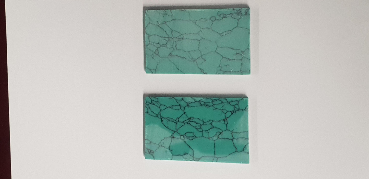 Turquoise Green M114 artificial stone blanks 30 x 50 x 2.2mm suitable for inlay. Can be cut with standard cutting tools - jewellery saw similar in characteristics to mother of pearl (hardness approx. 3. Can be sanded and polished same way as shell material. All pcs are A grade good on both sides.