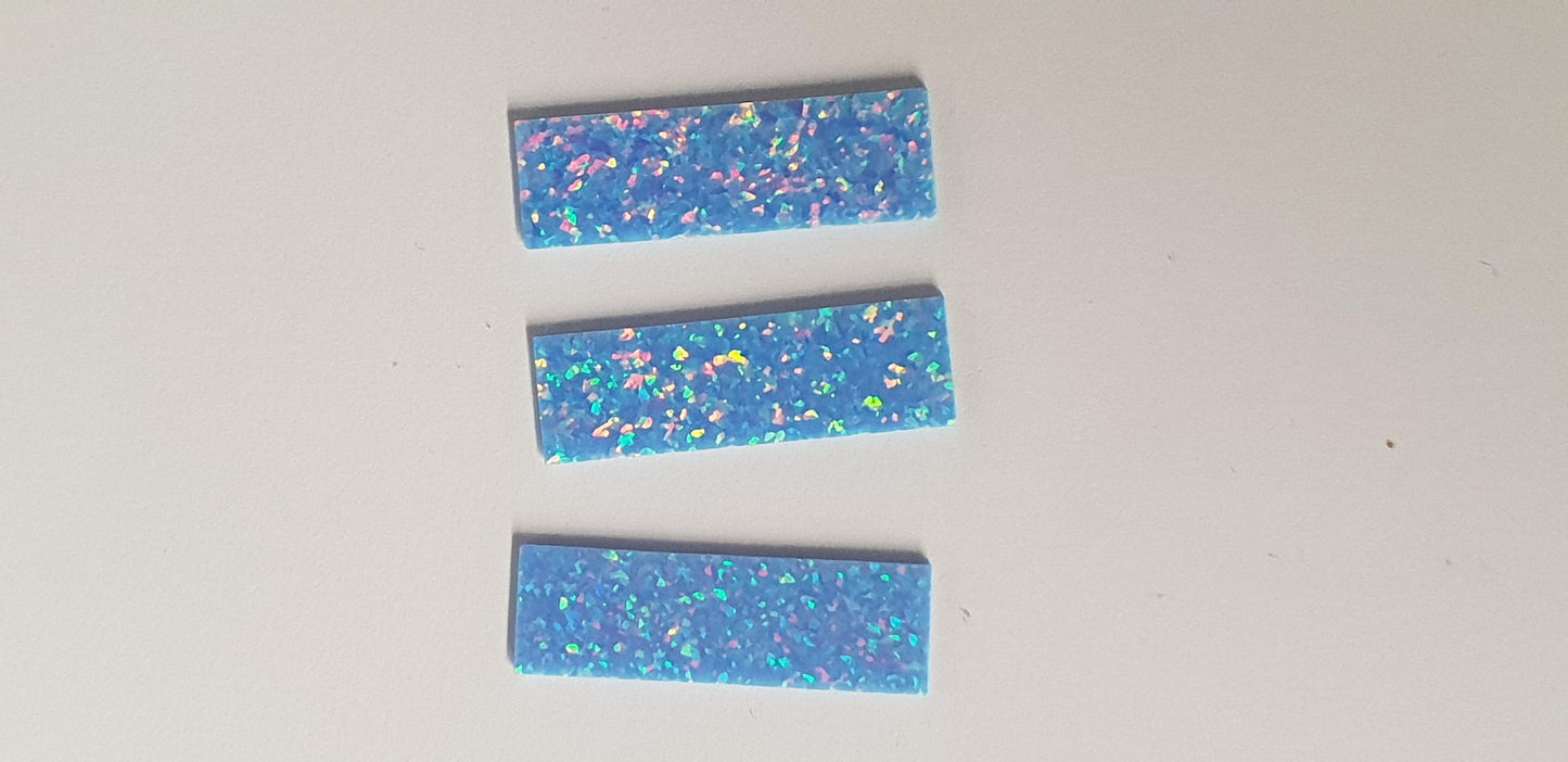 Opal blanks OP74 9 x 29 x 1mm flat cut pcs made from manufactured opal blocks suitable for inlay jewellery, bow slides. Opal blanks can be cut same way as mother of pearl blanks and are of similar hardness.