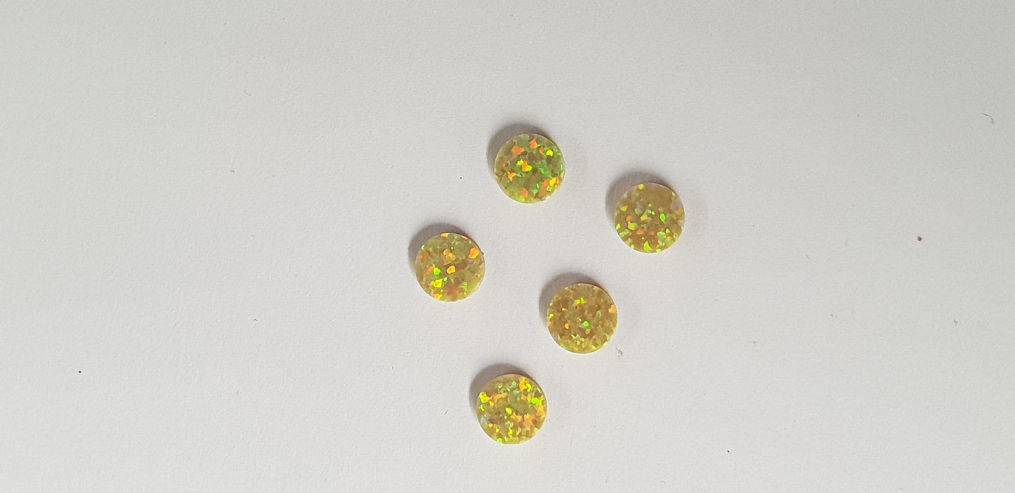 Opal dots OP46 7 x 1.3mm flat pcs made to specific diameter and thickness made from manufactured opal suitable for inlay, fretboard markers, jewellery, Opal dots can be worked same way as mother of pearl and are of similar hardness.