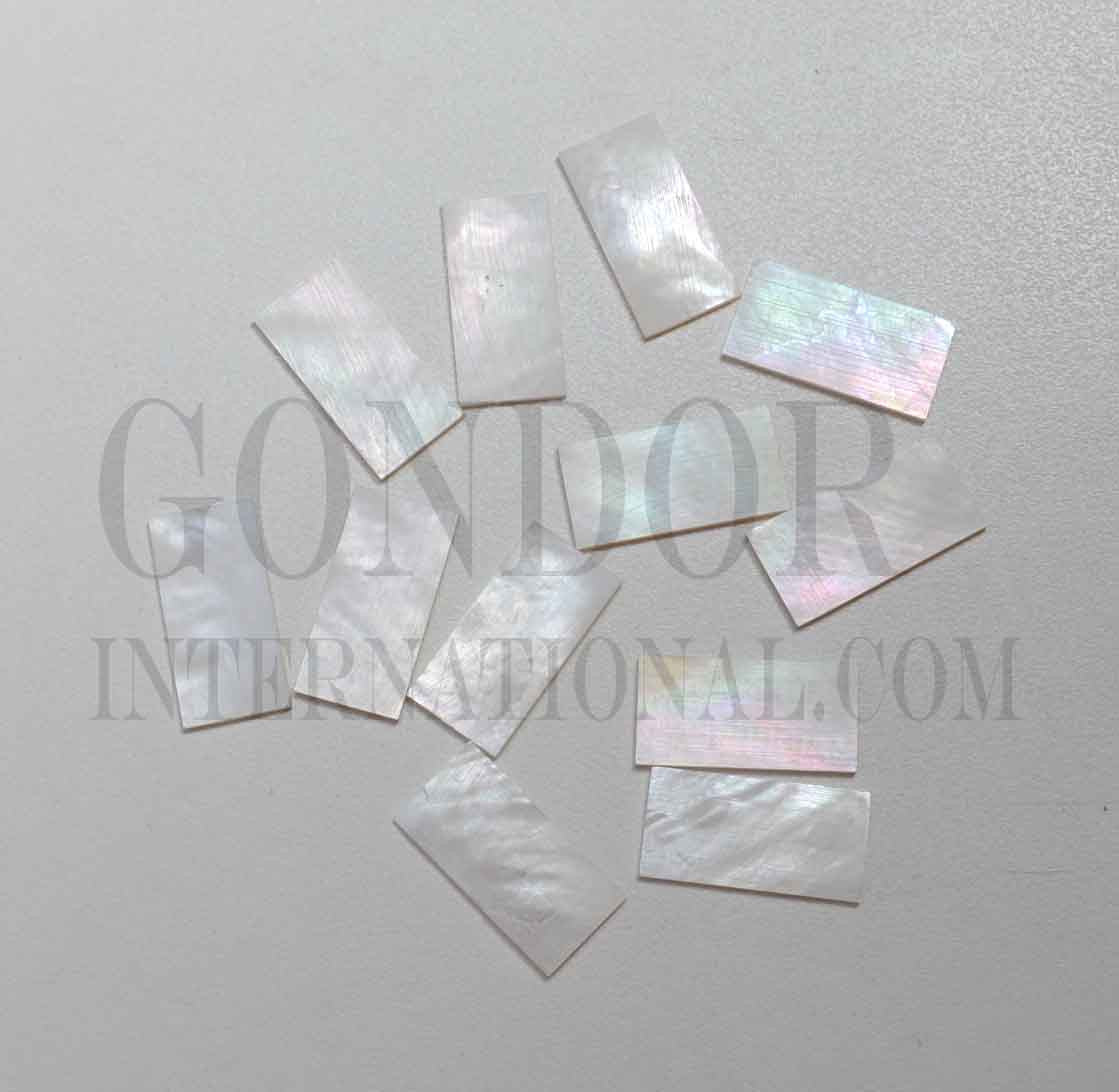 <p>White Mother of Pearl flat inlay blanks mix size 15 - 30mm (0.59 - 1.18") width x 20 - 40mm (0.79 - 1.57") length x 3mm (0.118") thickness A grade good on both sides</p>