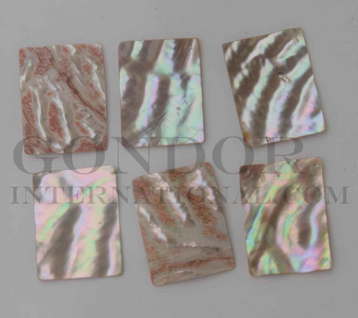 Awabi cabochons rectangle 30mm (1.18") width x 40mm (1.58") length x 2mm (0.08") thickness. Polished pcs with natural shell curve. Mainly used for jewellery but some pcs are also suitable for inlay or other decorative purposes. 