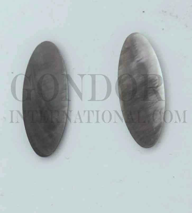 Black MOP cabochons oval 10.3mm (0.40") width x 26.2mm (1.03") length x 2.5mm (0.1") thickness. Polished pcs with flat back and natural shell curve. Mainly used for jewellery but  also suitable for inlay or other decorative purposes.