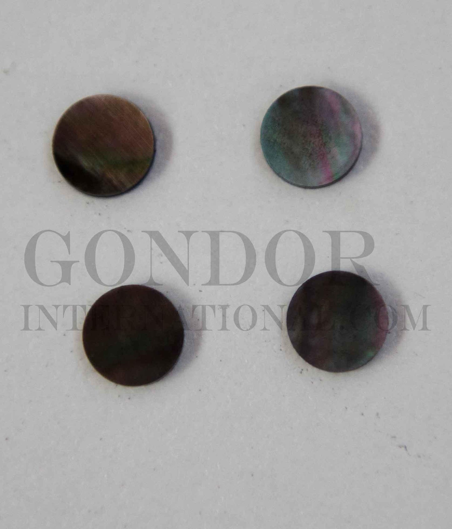 Black Mother of Pearl shell dots 12mm diameter 1.3mm thickness are round flat shell pcs cut to precise diameter and thickness. Ideal for use in inlay applications - for fretboard markers and general inlay or jewellery decorations. All pcs are A grade.