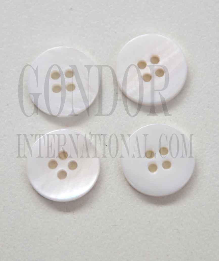 Fresh Water Pearl buttons 4 hole size 14L x 3mm thickness finished button.