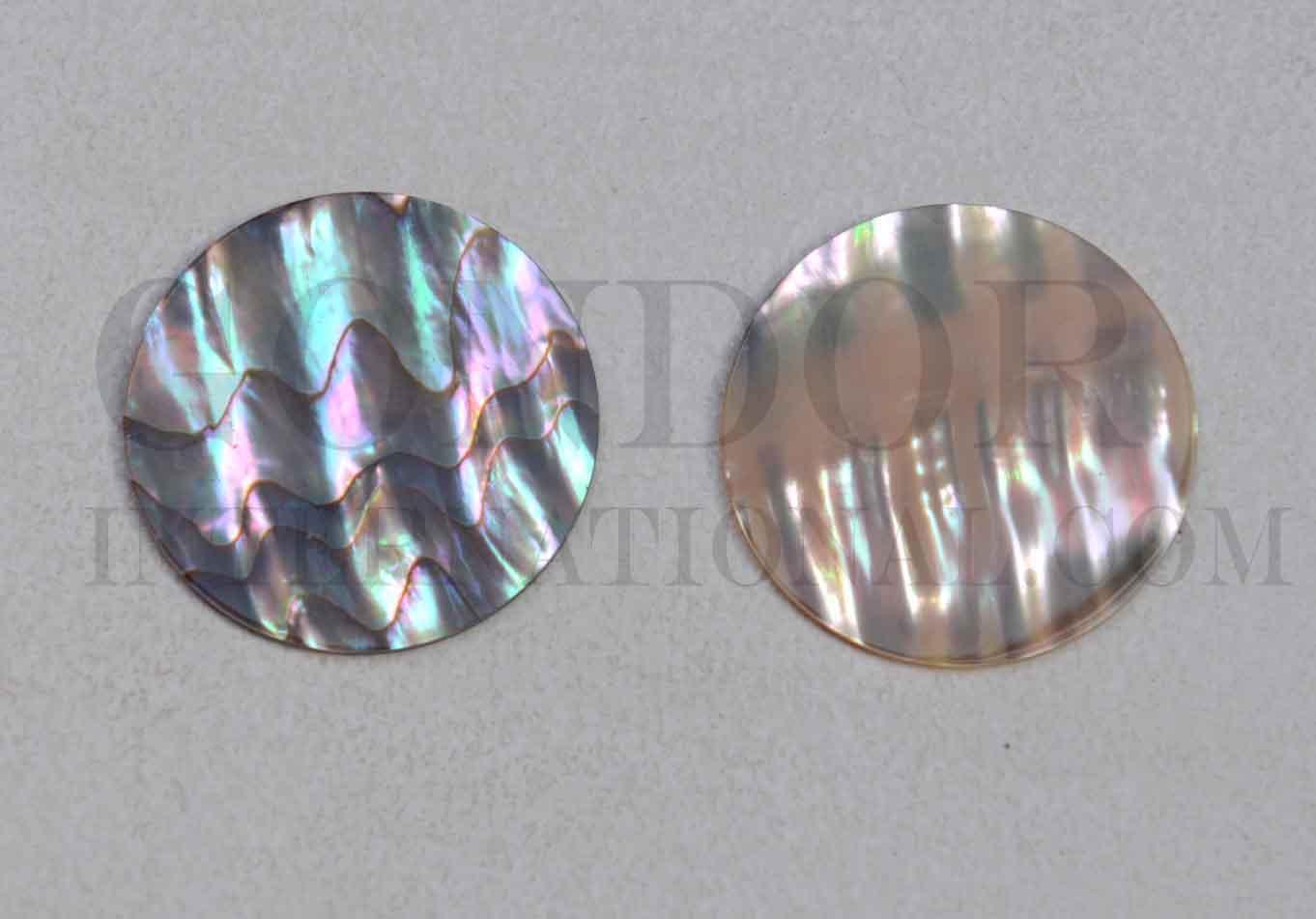 Green abalone discs 20mm (0.787") diameter x 0.5mm (0.02") thickness - round flat shell pcs cut to precise diameter and thickness. Ideal for use in inlay applications watch dials and general inlay, marquetry or jewellery decorations. All pcs are A grade. 