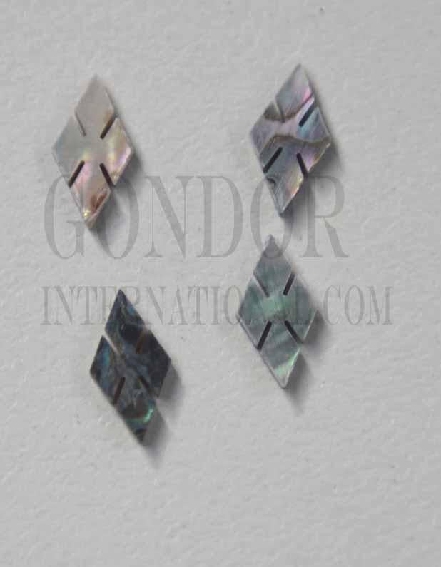 <p>Green abalone (Mexican green abalone) notched diamonds (slotted diamonds) size 11.5mm length x 6mm width x 1.5mm thickness. Some uses include fretboard markers, musical instrument inlay, furniture inlay, marquetry, pool cue inlay and other general decorative inlay and jewellery applications. All pcs are A grade.</p>