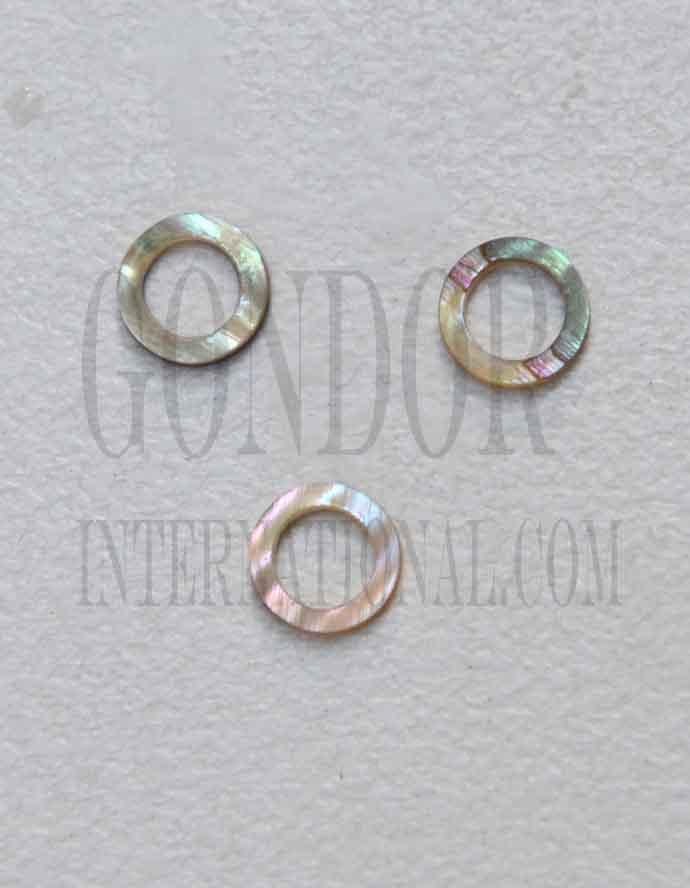 Green abalone (Mexican green abalone) rings size 6mm outside diameter x 4.05mm inside diameter x 1.5mm thickness. Some uses include fretboard markers, musical instrument inlay, furniture inlay, marquetry, pool cue inlay and other general decorative inlay and jewellery applications. All pcs are A grade.