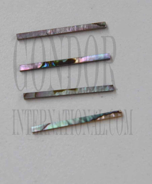 <p>Green abalone solid shell straight strips 1.5mm (0.06") width x 25mm (1") length x 1.3mm (0.05") thickness. A grade quality good on both sides, flat and uniform in thickness and width. Ideal for use in purfling on musical instruments - Ukuleles, guitars, mandolins etc. as well as in furniture, jewellery ans other decorative applications.</p>