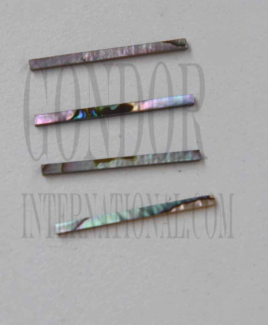 Green abalone solid shell straight strips 2.5mm (0.1") width x 25mm (1") length x 1.3mm (0.05") thickness. A grade quality good on both sides, flat and uniform in thickness and width. Ideal for use in purfling on musical instruments - Ukuleles, guitars, mandolins etc. as well as in furniture, jewellery ans other decorative applications.