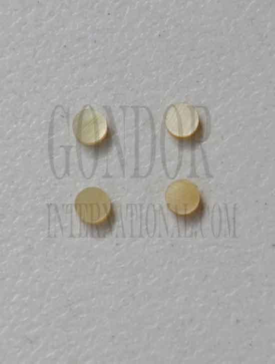 Gold MOP dots 2.35mm (3/32") diameter 1.3mm thickness are round flat shell pcs cut to precise diameter and thickness. Ideal for use in inlay applications - for fretboard markers and general inlay or jewellery decorations. All pcs are A grade.<br />