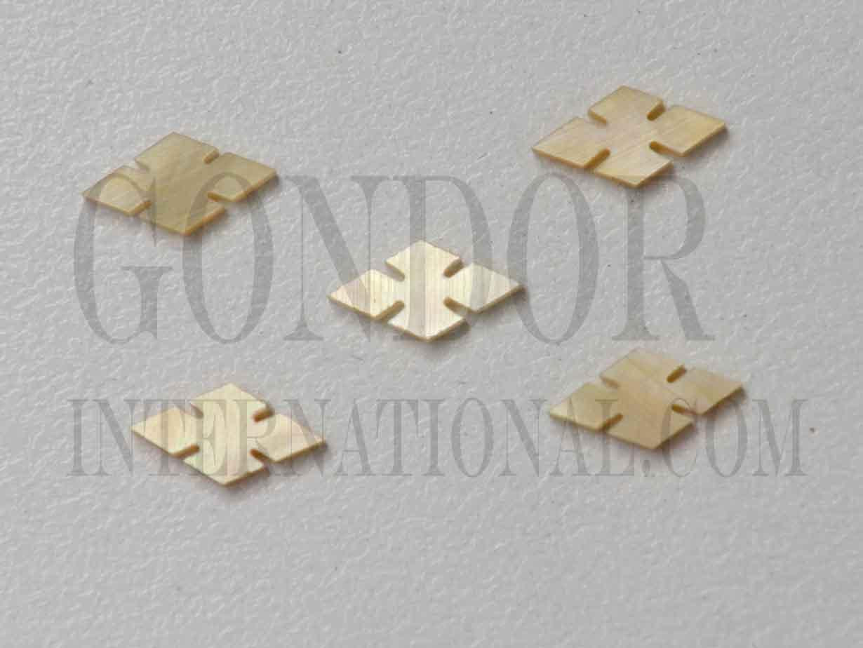 Gold Mother of Pearl notched diamonds (slotted diamonds) size 14.5mm length x 7.5mm width x 1.5mm thickness. Some uses include fretboard markers, musical instrument inlay, furniture inlay, pool cue inlay and other general decorative inlay and jewellery applications. All pcs are A grade.