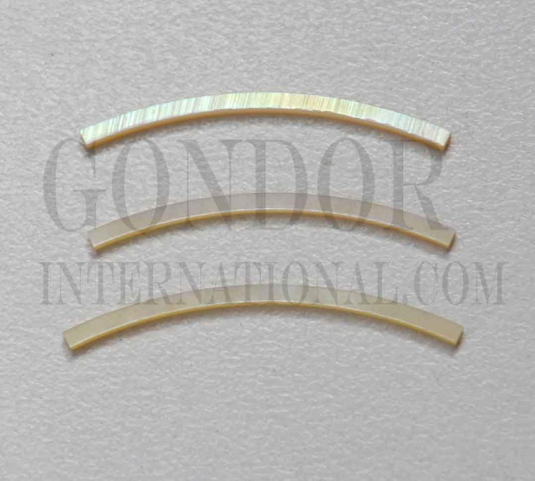 Gold MOP solid shell curved strips 1.6mm (0.063") width x 25mm (1") length x 1.3mm (0.05") thickness x 110mm (4.33") inside diameter. A grade quality good on both sides, flat and uniform in thickness and width. Ideal for use in purfling and rosettes on musical instruments - Ukuleles, guitars, mandolins etc. as well as in furniture, jewellery and other decorative applications.