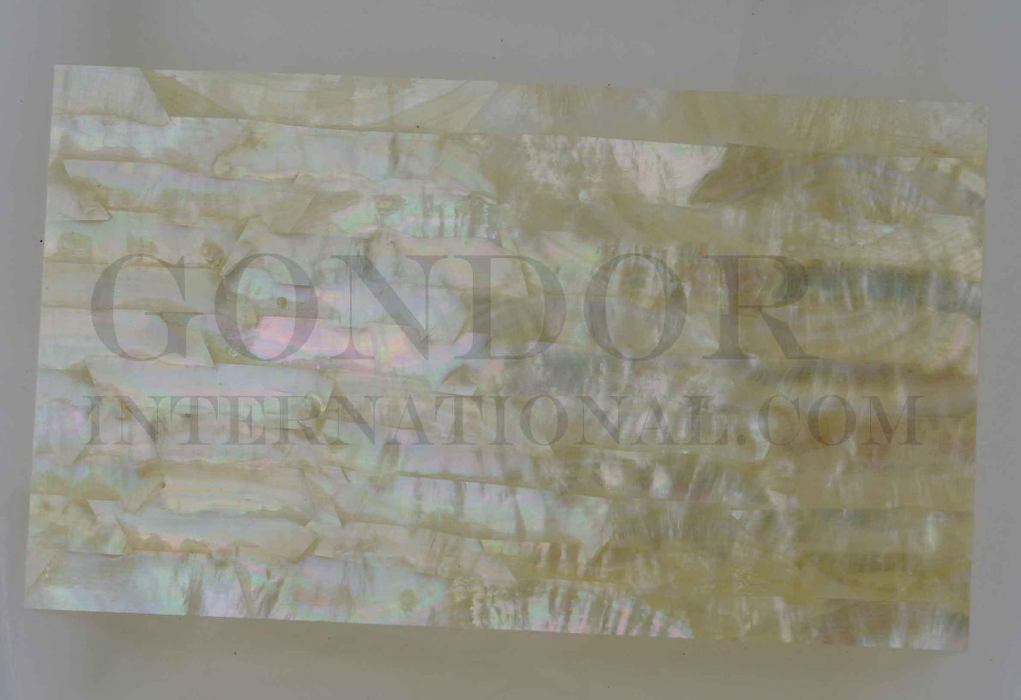 Gold MOP veneer also called Gold MOP sheet or Gold MOP shell paper. Made from thin slices of genuine shell. Standard sheet size 140mm (5.51") width x 240mm (9.45") length x 0.15mm (0.006") thickness  Suitable for signwriting, fishing lures, jewellery, architectural application, furniture and many other applications.