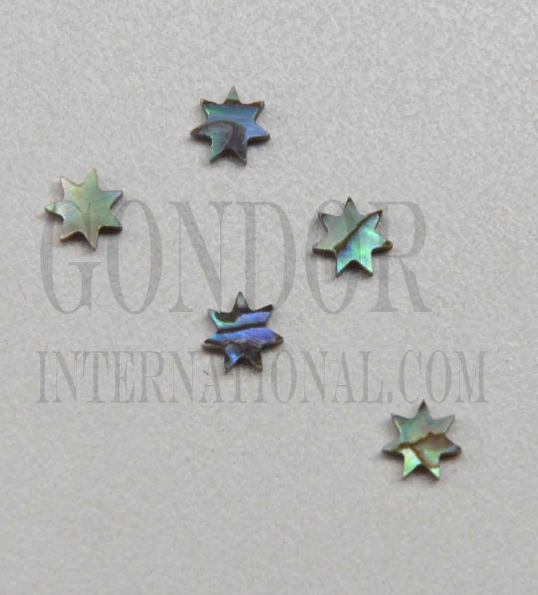 <p>Paua abalone (New Zealand Paua abalone) 7 point star size 7mm (0.276") x 1.5mm (0.06") thickness. Some uses include fretboard markers, musical instrument inlay, furniture inlay, marquetry, pool cue inlay and other general decorative inlay and jewellery applications. All pcs are A grade.</p>