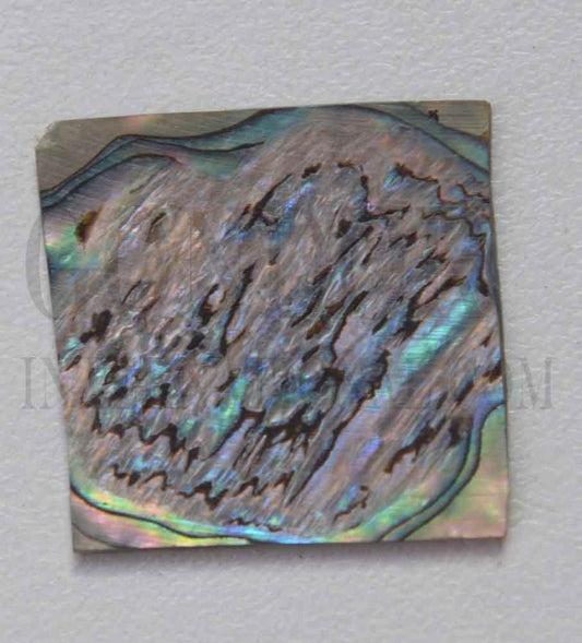 Paua abalone (New Zealand Paua shell) flat inlay blanks heart material size 25 - 30mm (1 - 1.18") width x 25 - 30mm (1 - 1.18") length x 1.3mm (0.05") thickness A grade good on at least 1 side may have some worm damage or shell skin on edges of reverse side.