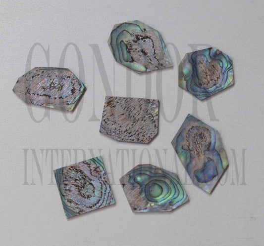 Paua New Zealand abalone flat inlay blanks heart material mix size approx. 15-30mm (0.6 - 1.18") width x 15 - 30mm (0.6 - 1.18") length x 1.3mm (0.05) thickness approx. 10 - 16pcs per oz. A grade material - good quality on at least 1 side reverse side may have some worm damage or shell skin on edges.