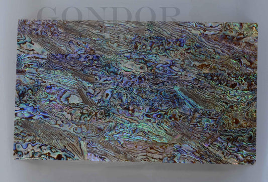 New Zealand Paua shell laminated shell sheets B grade mixed blue, green, pink colour made from genuine shell. Each sheet has shell throughout consisting of layers of smaller shell pcs. Sheet size 235 x 135mm (9.25 x 5.3"). Thickness 0.5mm (0.02") Ideal for inlay work, jewellery, knife handles. Economical and easy to cut. All layers are same consistency throughout the sheet.