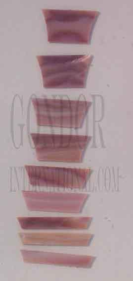 <p>A set of 9pcs Pink mussel Crown inlays. Suitable for Les Paul or SG style guitars. Shell thickness 1.5mm. Flat and ready to be installed.</p>