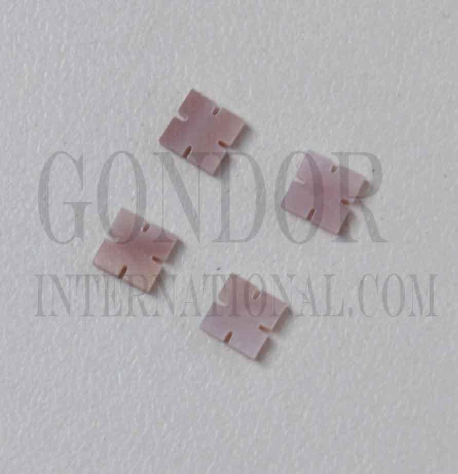 <p>Pink mussel shell notched squares size 5.5mm (0.216") square x 1.5mm (0.06") thickness. Some uses include fretboard markers, musical instrument inlay, furniture inlay, marquetry, pool cue inlay and other general decorative inlay and jewellery applications. All pcs are A grade.</p>