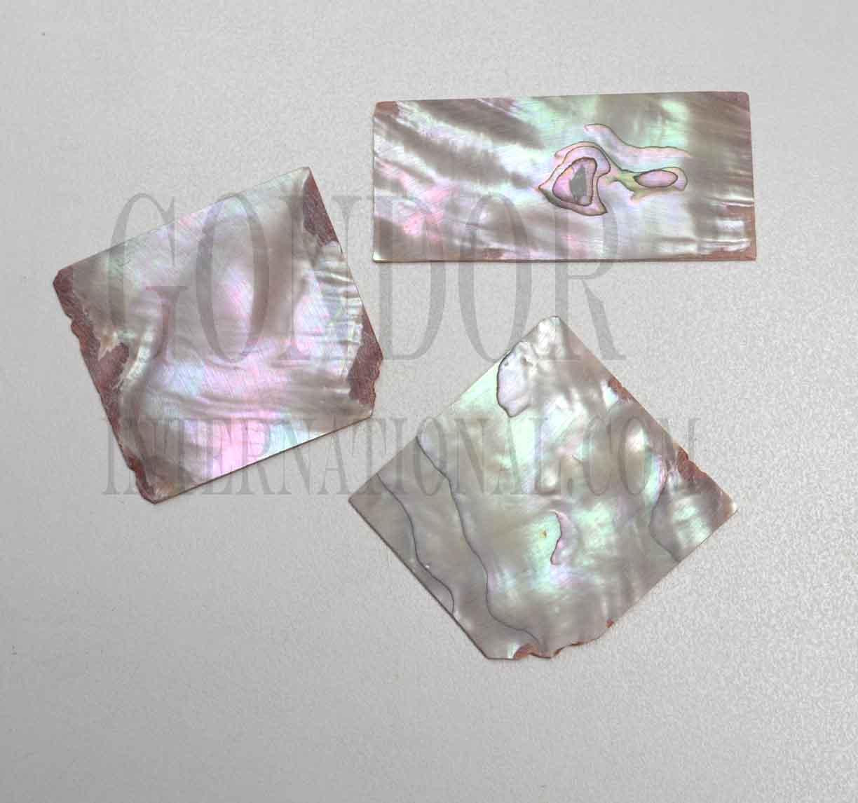 Red abalone flat inlay blanks large mix size approx. 30-50mm (1.18 - 2") width x 45-75mm (1.77 - 3") length x 1.5mm (0.06) thickness approx. 2 - 4pcs per oz. A grade material - good quality on at least 1 side.