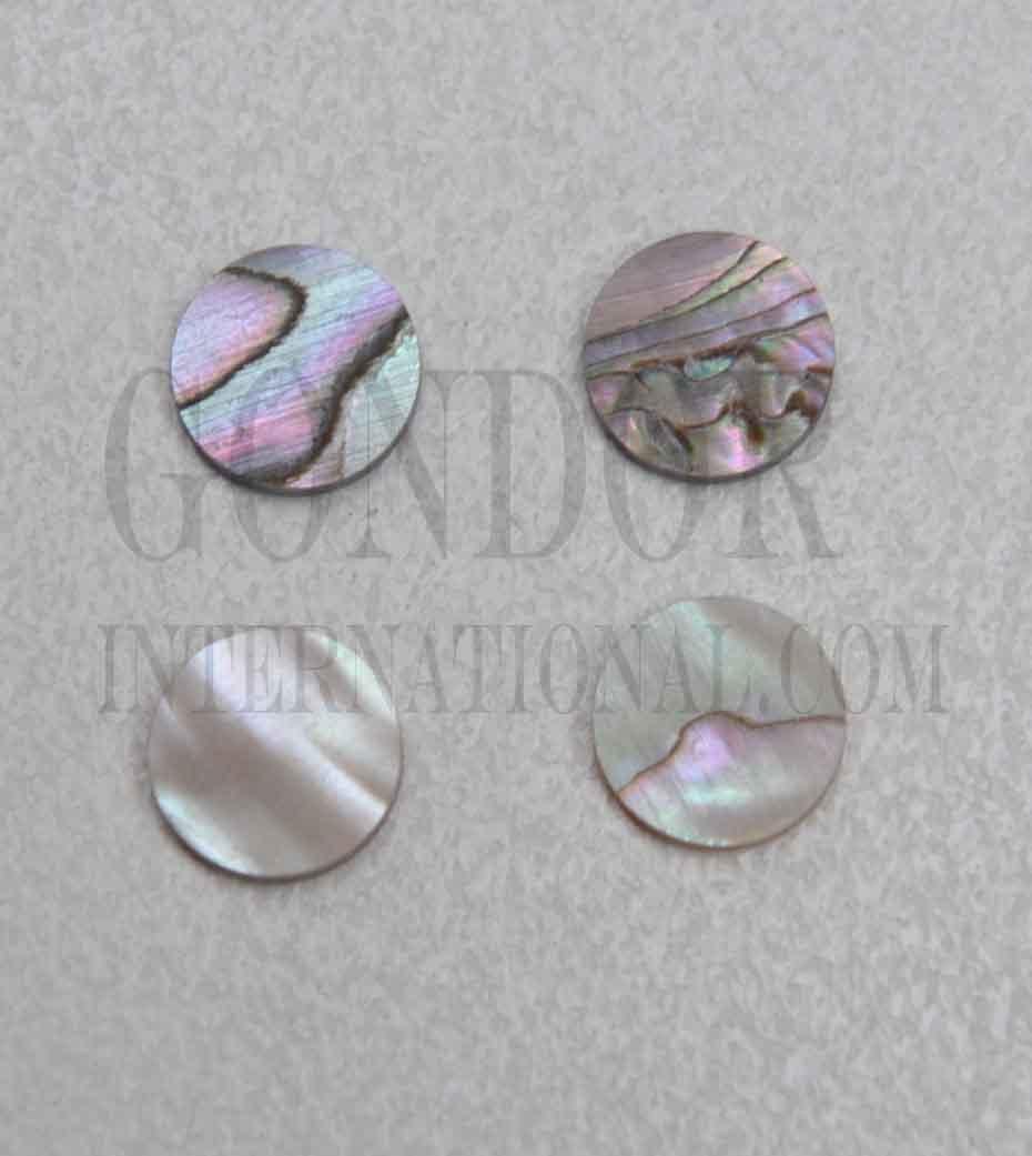 Red abalone dots 6.35mm (1/4") diameter x 1.5mm thickness - round flat shell pcs cut to precise diameter and thickness. Ideal for use in inlay applications - for fretboard markers, bow frogs and general inlay or jewellery decorations. All dots are A grade good on both sides. 