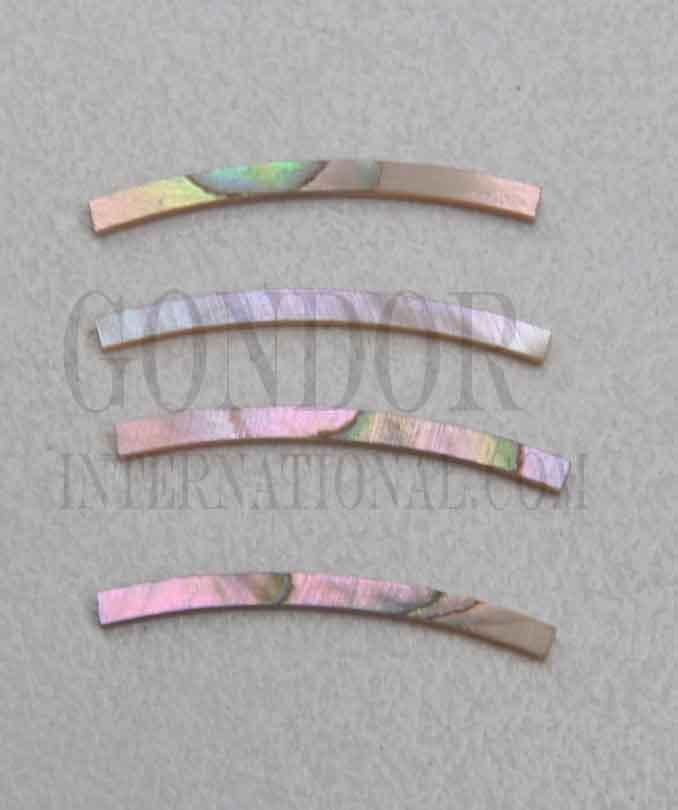 Red abalone solid shell curved strips 1.6mm (0.063") width x 24mm (0.945") length x 1.3mm (0.05") thickness x 125mm (4.92") inside diameter. A grade quality good on both sides, flat and uniform in thickness and width. Ideal for use in purfling and rosettes on musical instruments - Ukuleles, guitars, mandolins etc. as well as in furniture, jewellery and other decorative applications.