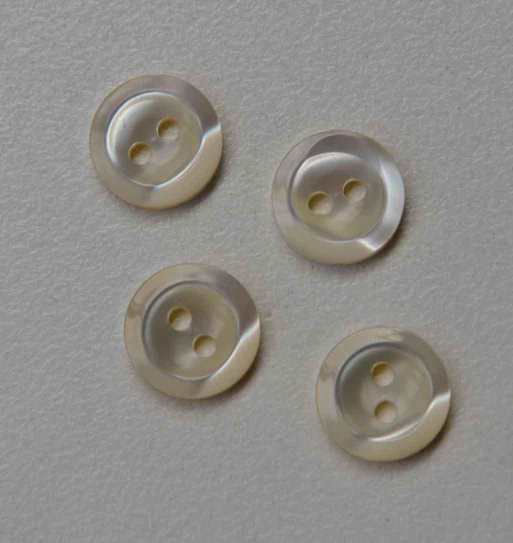 Trochus shell buttons 2 hole 17L x 2.3mm thickness finished buttons.