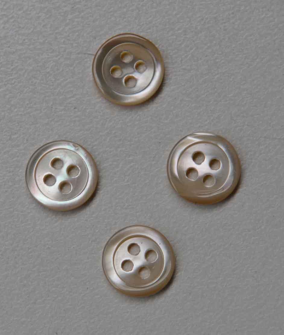 Trochus shell buttons 4 hole 17L x 1.9mm thickness finished buttons.