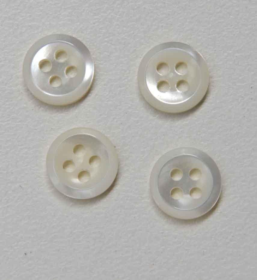 Trochus shell buttons 4 hole 18L x 1.6mm thickness finished buttons.