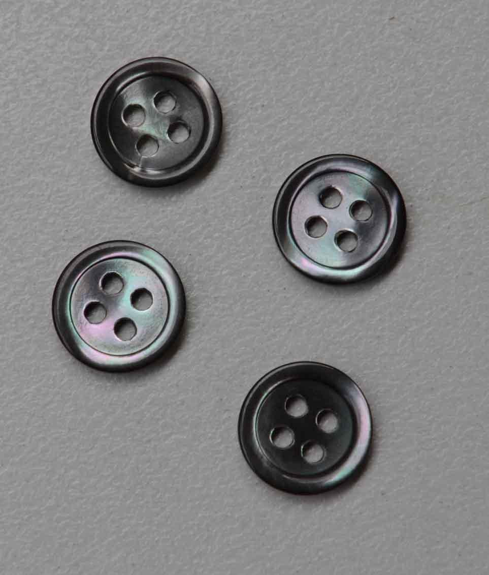 Trochus shell buttons grey/black 4 hole 17L x 1.6mm thickness finished buttons.