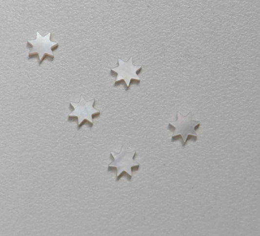 White Mother of Pearl 7 point star size 7mm (0.275") x 1.5mm (0.06") thickness. Some uses include fretboard markers, musical instrument inlay, furniture inlay and other general decorative inlay and jewellery applications. All pcs are A grade.