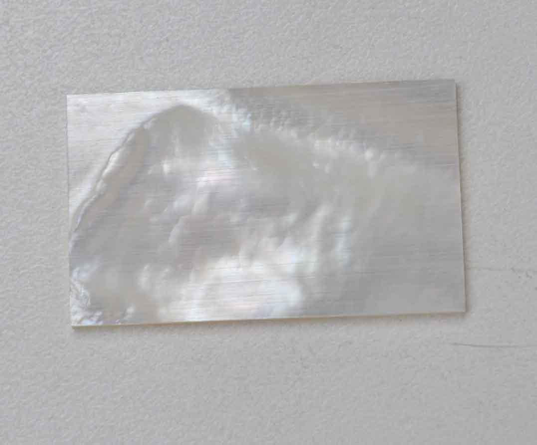 <p>White Mother of Pearl flat inlay blanks size 20mm (0.79") width x 40mm (1.57") length x 1mm (0.04") thickness A grade clean on both sides.</p>