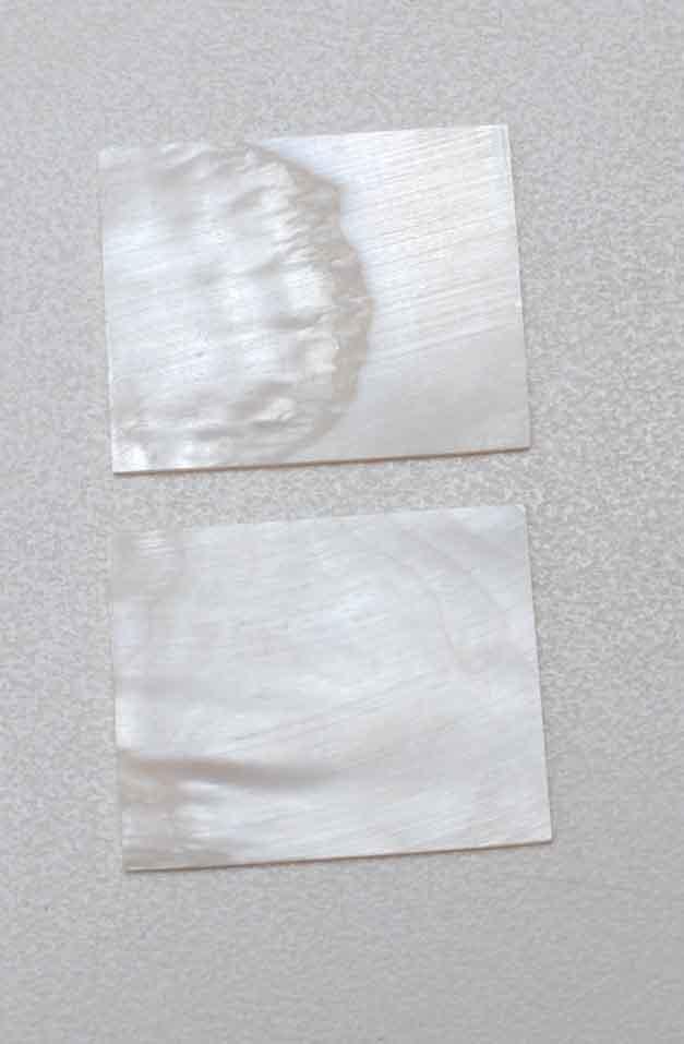 <p>White Mother of Pearl flat inlay blanks size 21.75mm (0.856") width x 31.8mm (1.25") length x 1.55mm (0.061") thickness A grade clean on both sides.</p>