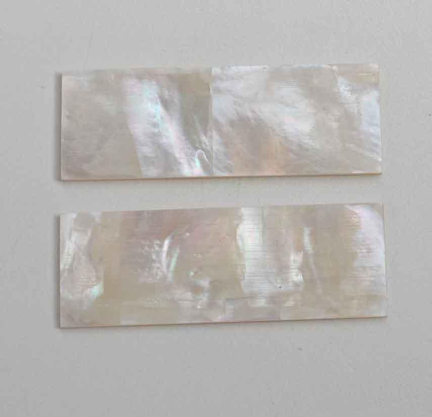 White Mother of Pearl flat inlay blanks size 23mm (0.9") width x 63.5mm (2.5") length x 2.5mm (0.1") thickness A grade clean on both sides.