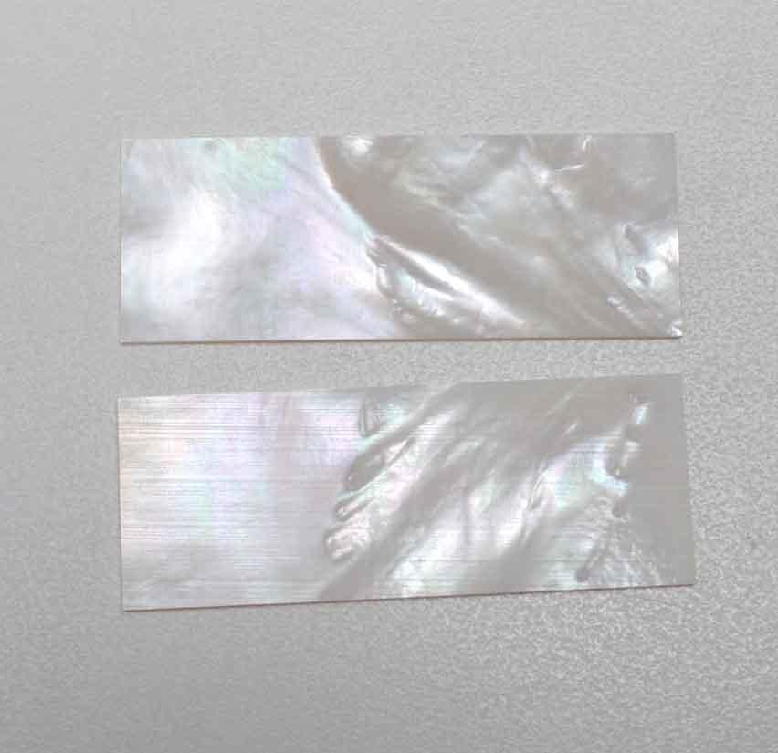 <p>White Mother of Pearl flat inlay blanks size 25mm (1") width x 80mm (3.14") length x 3mm (0.118") thickness A grade clean on both sides.</p>